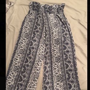 Hippie pants- tight around waist, flair at bottom, kind of short- ankle length